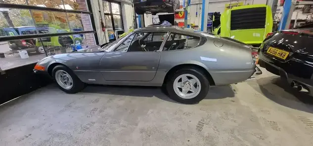 Side shot of a silver grey classic car