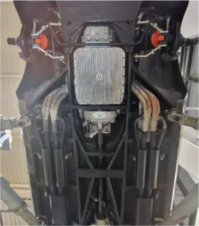 Spotless underside of an engine after it has been dry ice blast cleaned