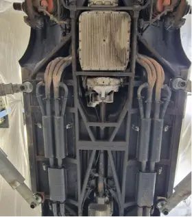 Dirty underside of an engine